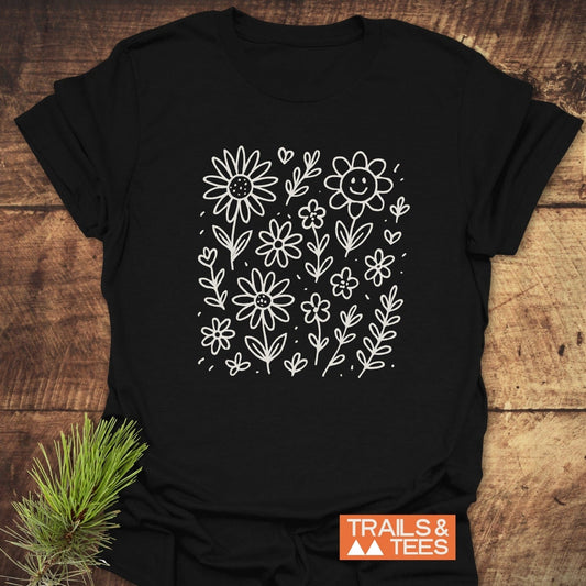 Wildflower Smiles T-Shirt featuring a delicate floral design, perfect for active wear. A versatile addition to any wardrobe, blending elegance with comfort.