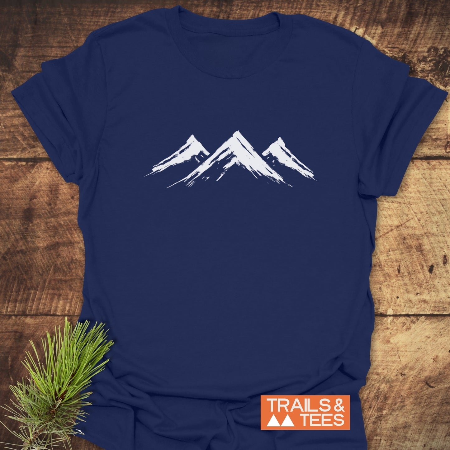 Three Mountains T-Shirt featuring a close-up of a top with white mountain designs, capturing the essence of an activewear t-shirt.