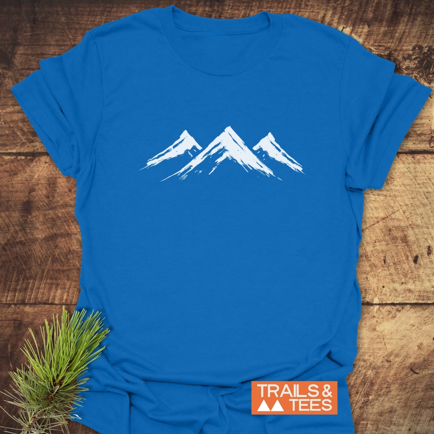 Three Mountains T-Shirt featuring a mountain design on the front, ideal for active wear.
