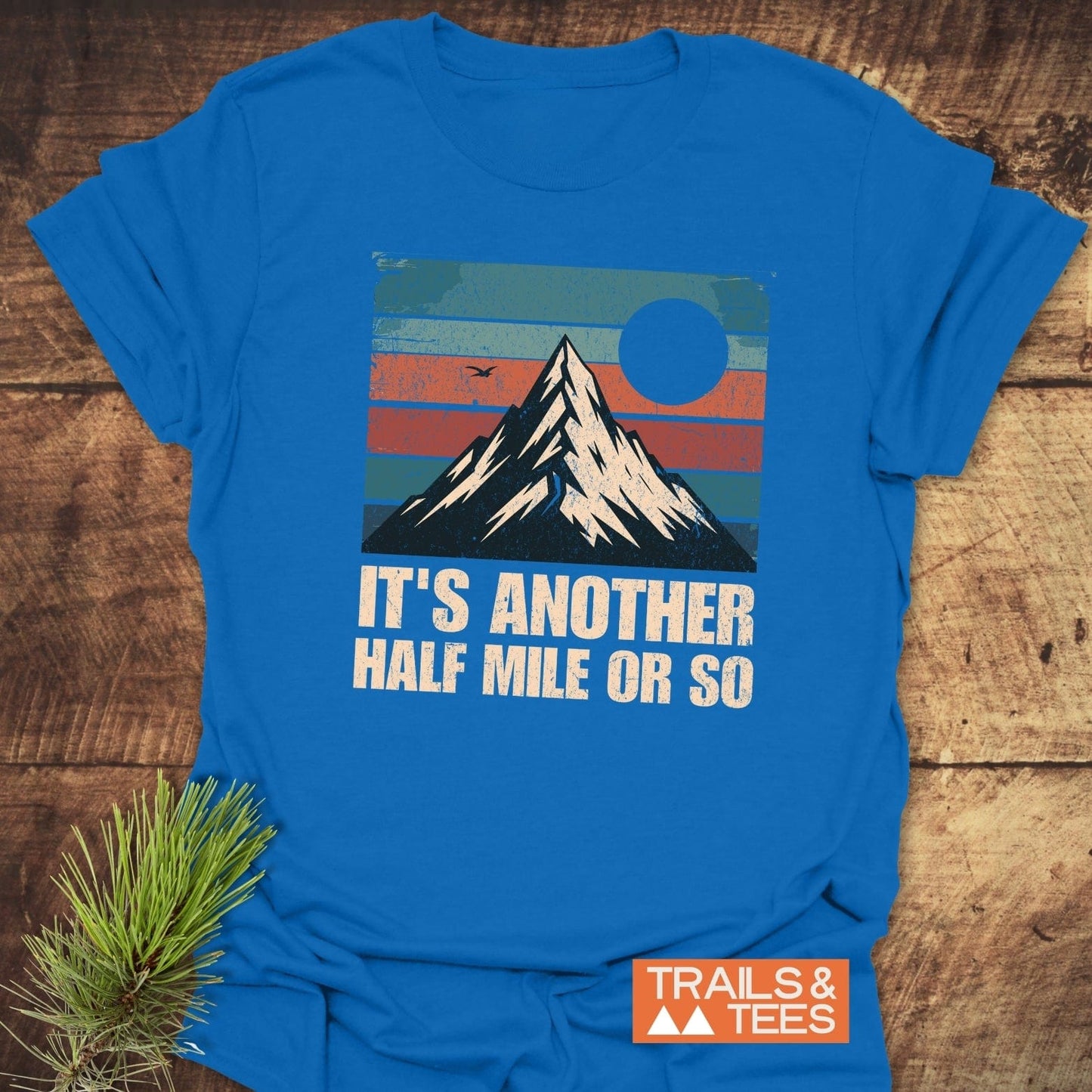 It's Another Half Mile Or So T-Shirt featuring bold text on the front, perfect for activewear enthusiasts seeking comfort and style in their workout clothing.