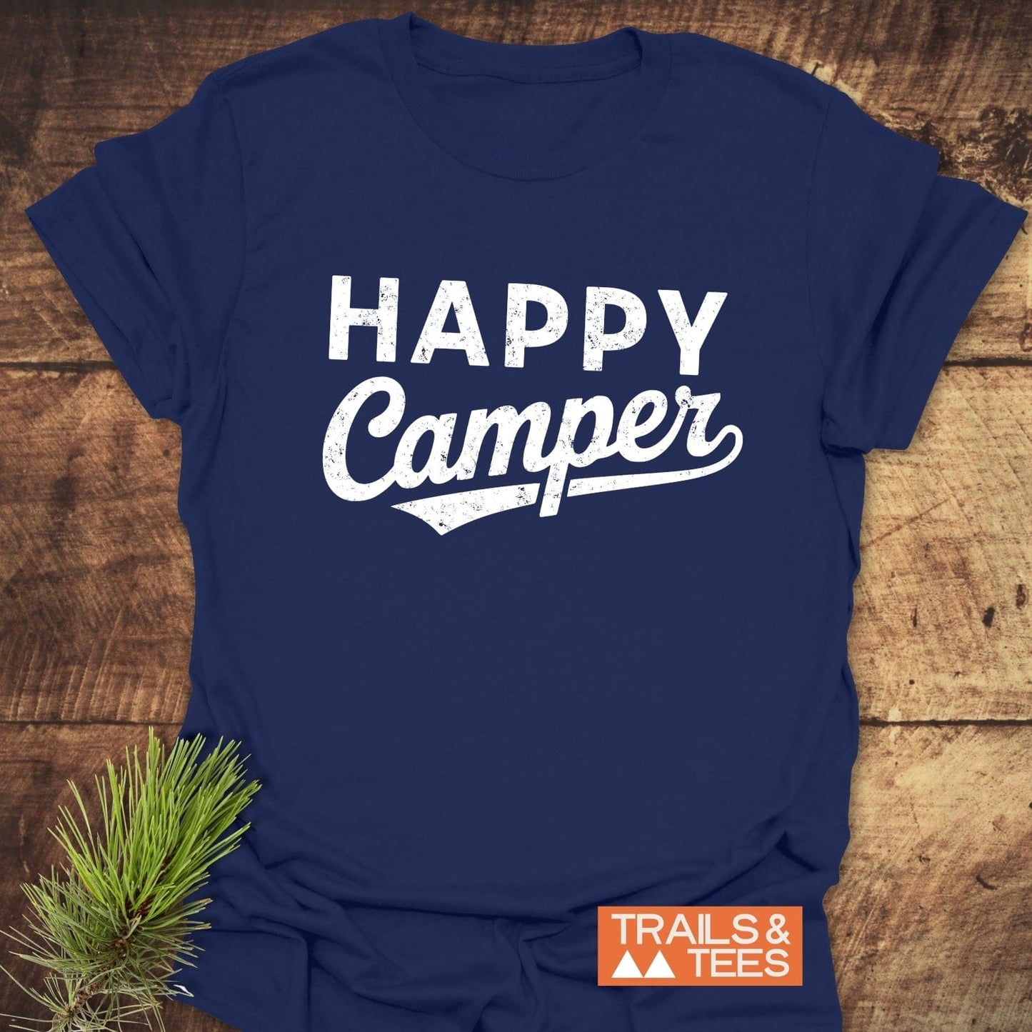 Happy Camper T-Shirt featuring a bold text print. Ideal for activewear, this top seamlessly combines style and comfort for any adventure enthusiast.