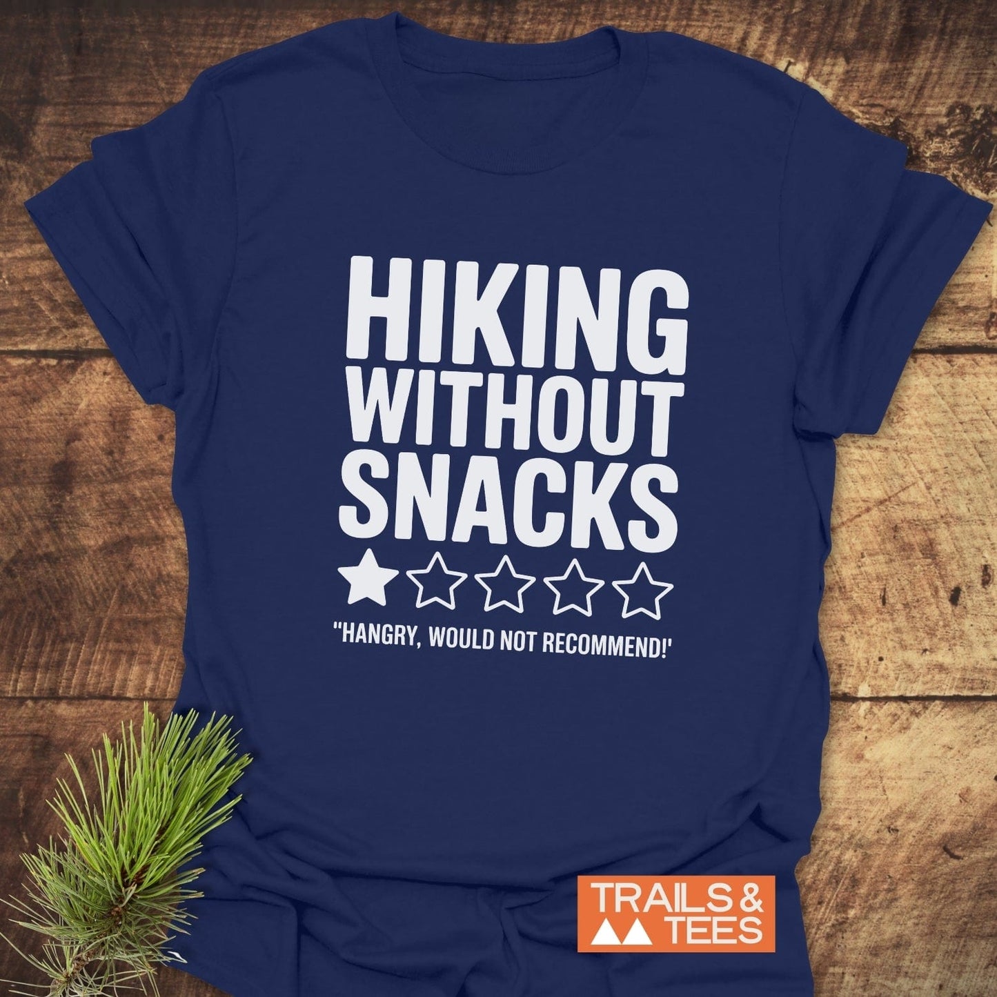 Hiking Without Snacks T-Shirt featuring bold white text on a blue background, designed for active wear enthusiasts.