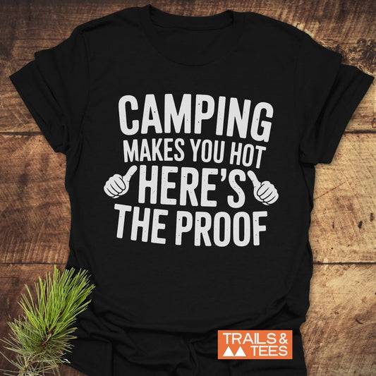 Black T-shirt featuring bold white text reading Camping Makes You Hot, designed as an active shirt suitable for outdoor enthusiasts.