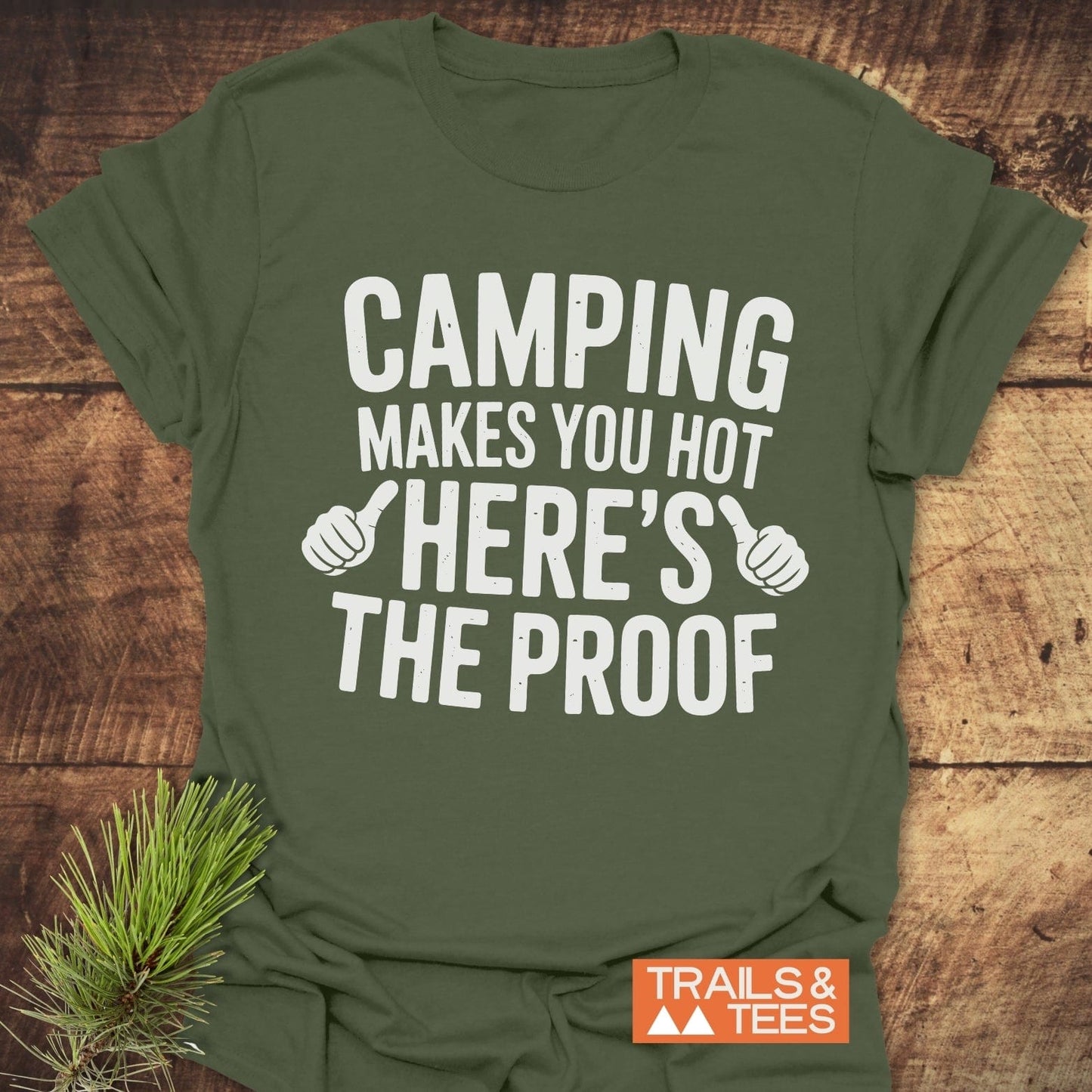 Camping Makes You Hot T-Shirt featuring bold white text on a green activewear shirt, perfect for outdoor enthusiasts.