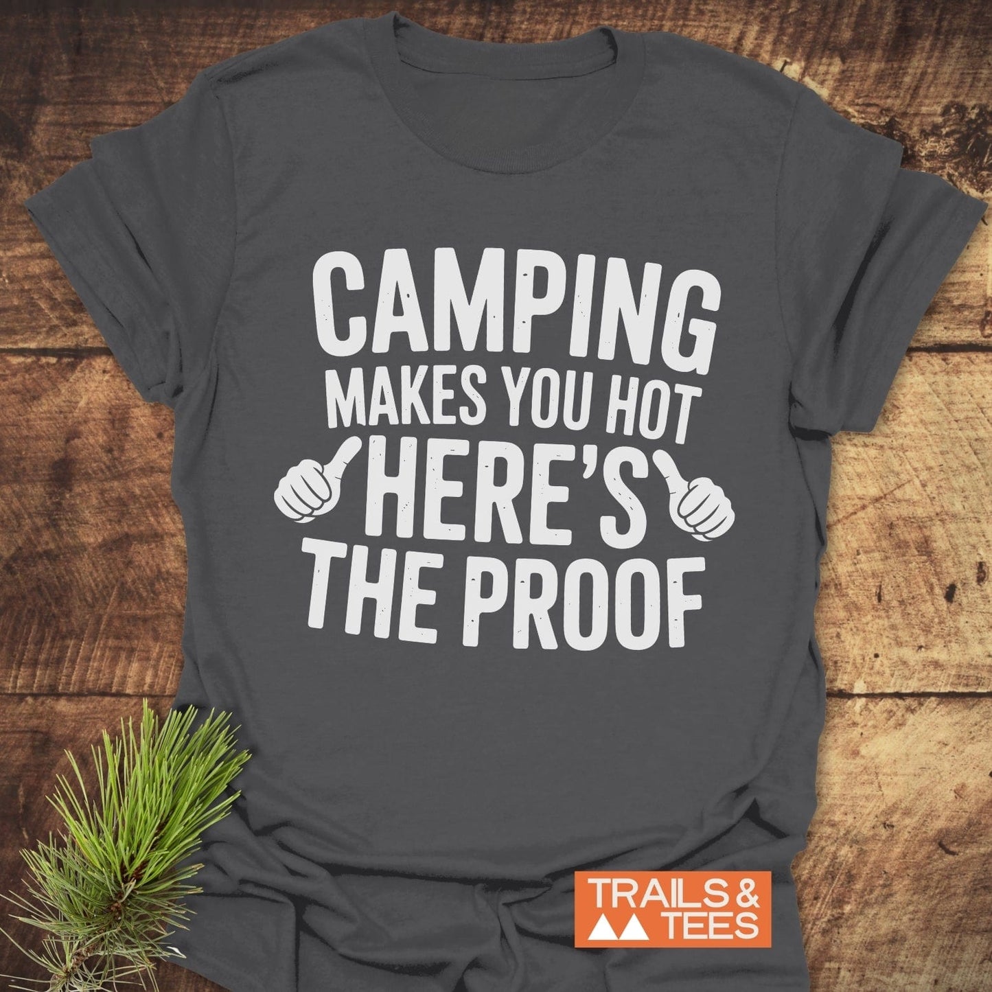 Grey Camping Makes You Hot t-shirt featuring bold white text, ideal for active lifestyles and outdoor enthusiasts.
