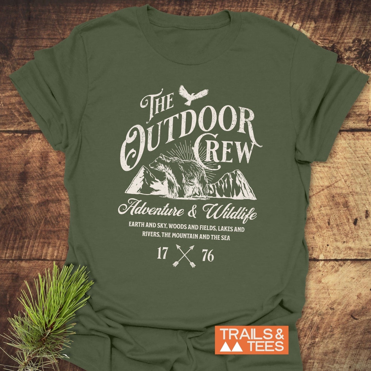 The Outdoor Crew Vintage T-Shirt featuring a white bird with spread wings, designed for comfort and durability, ideal for outdoor enthusiasts.