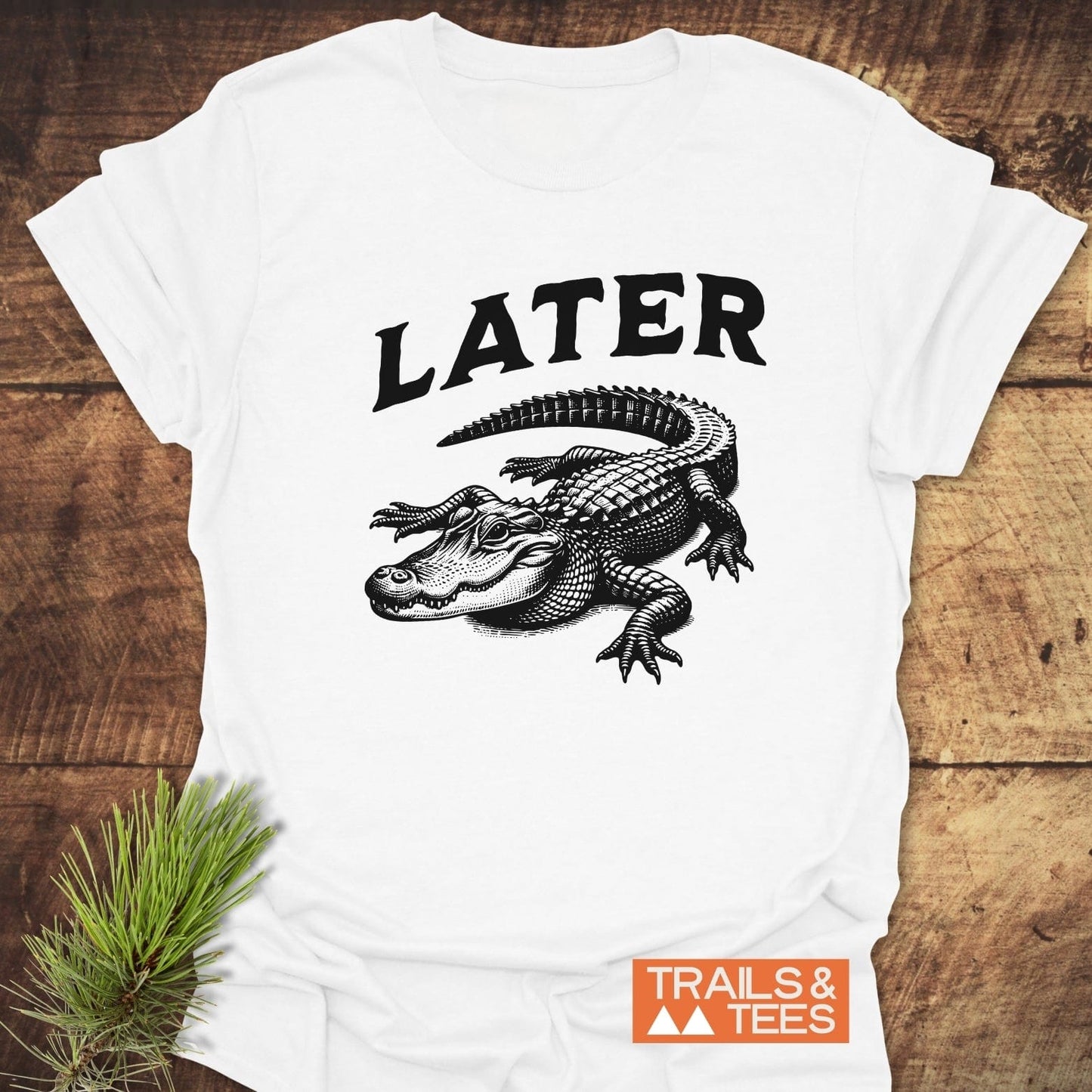 Later Alligator T-Shirt featuring a black and white crocodile drawing and black letter e, crafted from lightweight cotton for outdoor adventures.
