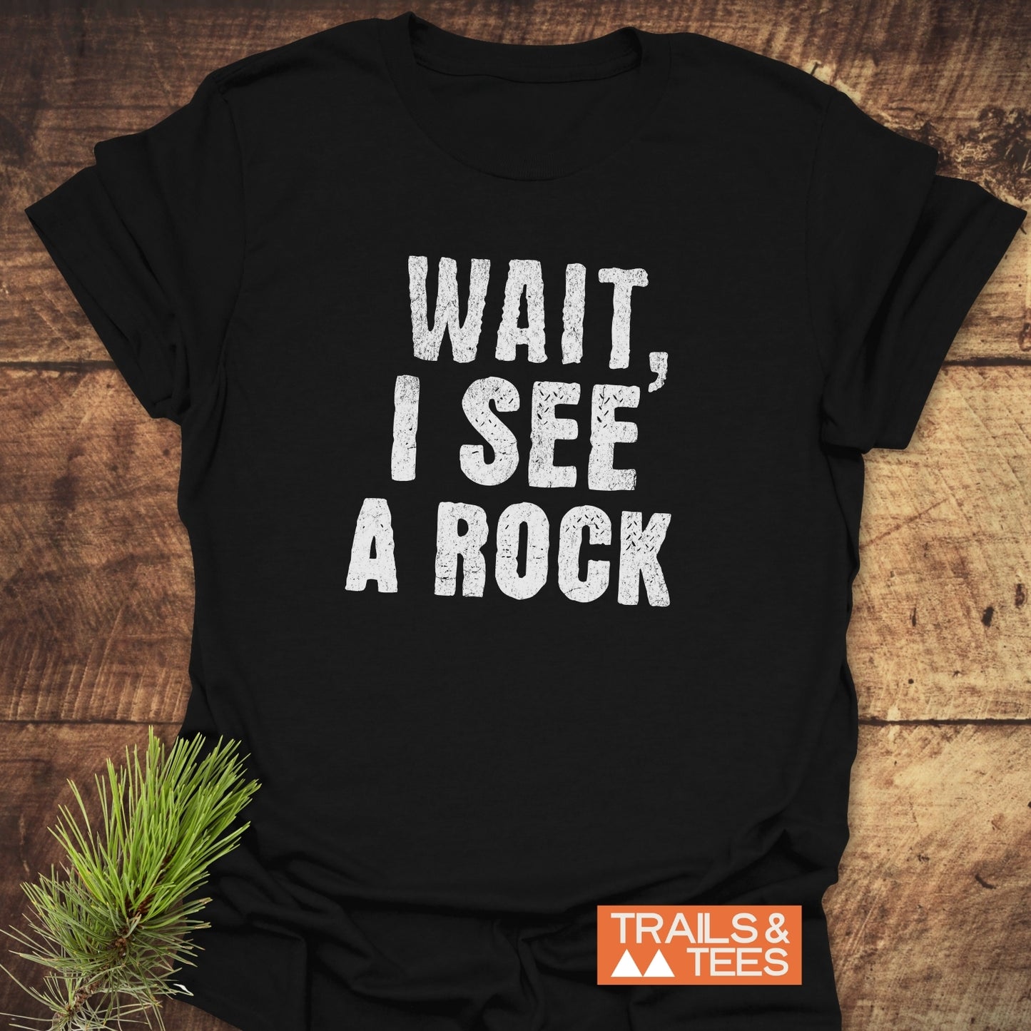Wait, I See A Rock T-Shirt featuring white text on black, crafted from lightweight cotton for comfort and durability, ideal for outdoor adventures.
