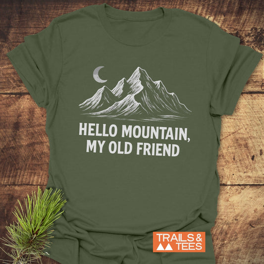 Hello Mountain, My Old Friend T-Shirt featuring a white crescent moon design on a green background, crafted from lightweight cotton for outdoor comfort and durability.