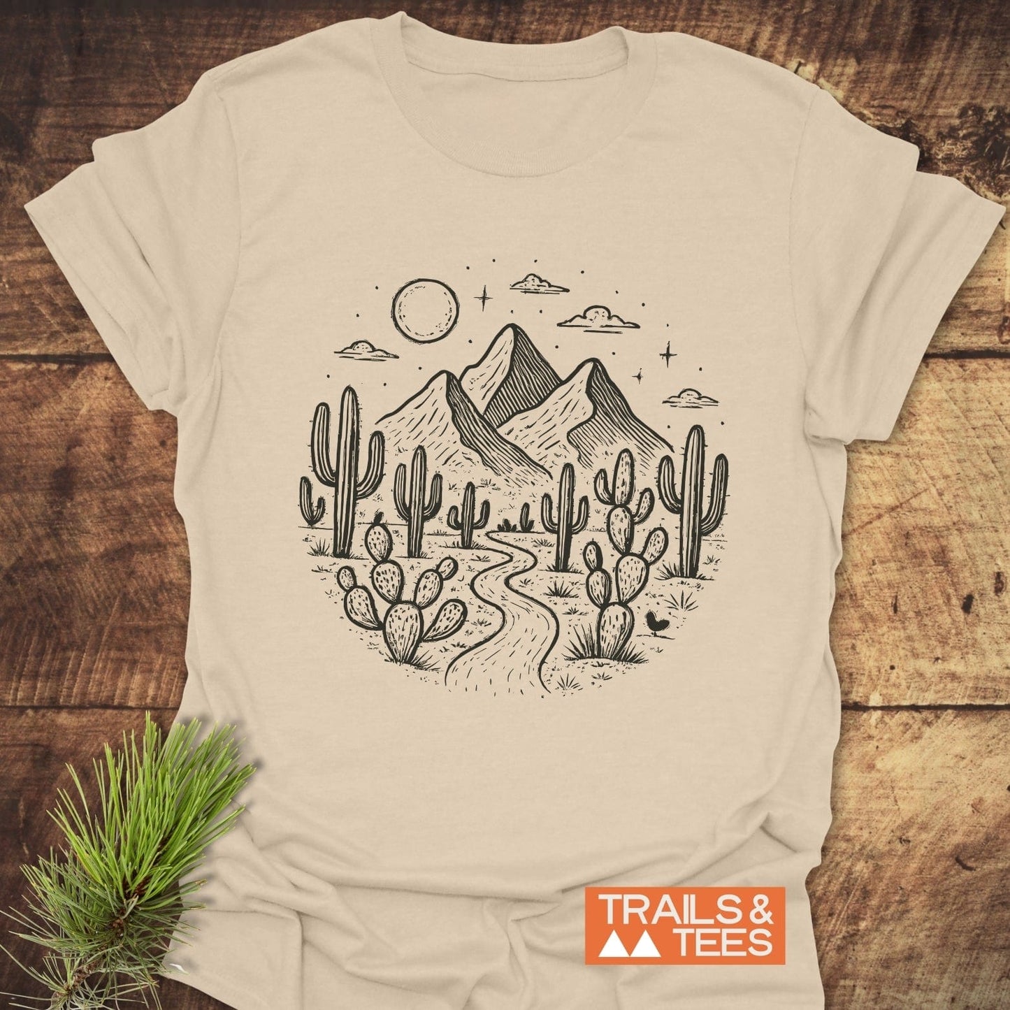 Desert Night T-Shirt featuring a black and white mountain and cactus design, crafted from lightweight cotton for comfort and durability, ideal for outdoor enthusiasts.