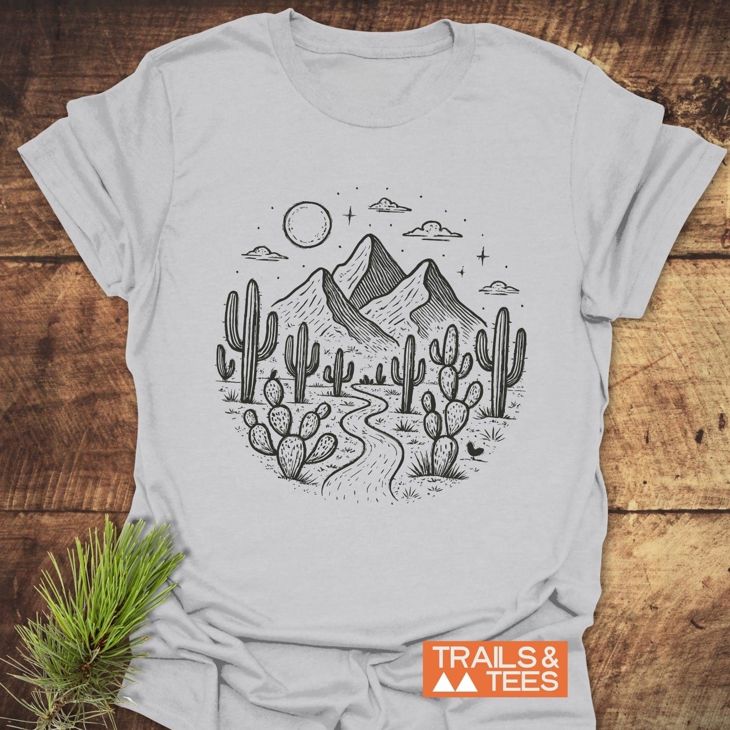 Desert Night T-Shirt featuring a mountain and cactus illustration, crafted from soft ring-spun cotton, pre-shrunk with durable prints for lasting outdoor comfort.