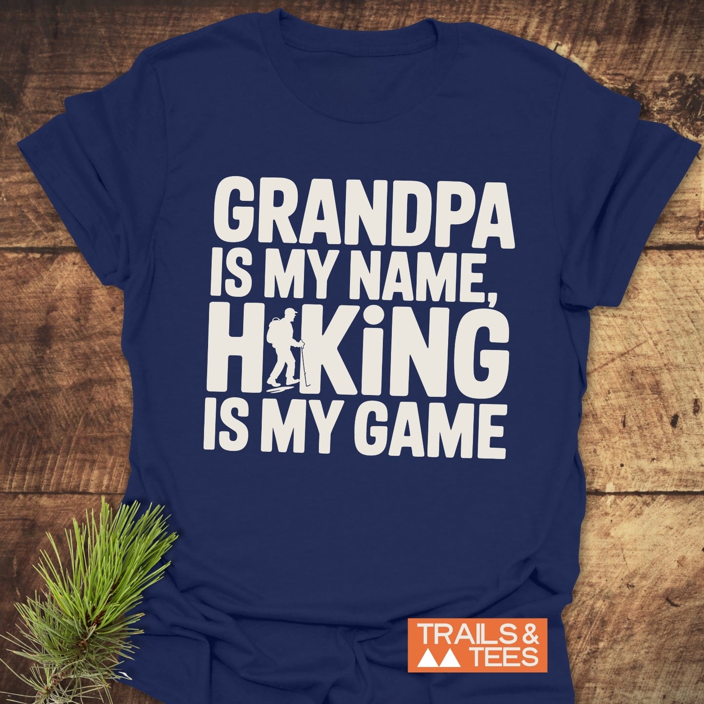 Grandpa Is My Name Hiking T-Shirt featuring durable white text on a blue tee, crafted from lightweight, ring-spun cotton for comfort and outdoor adventures.