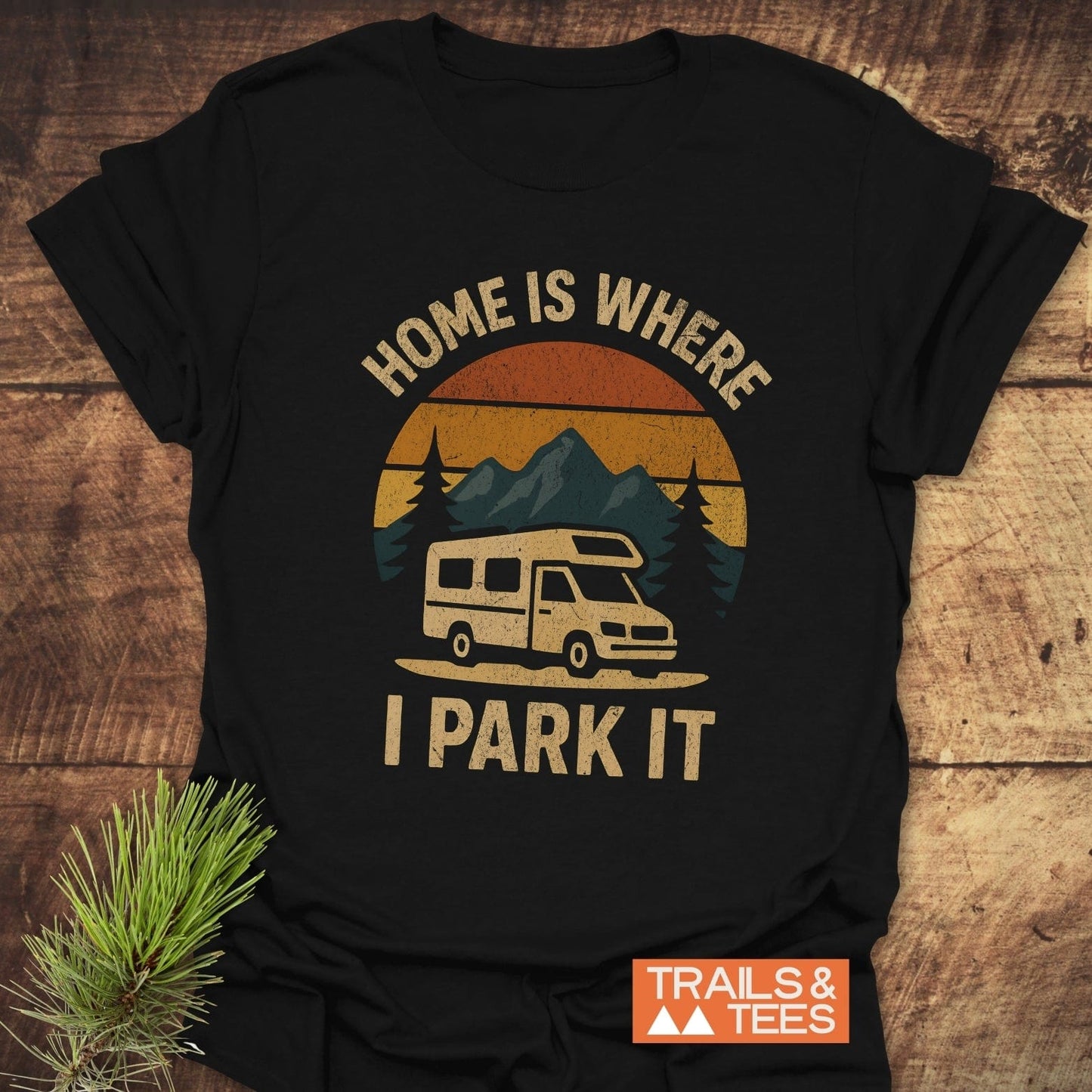 Home Is Where I Park It T-Shirt featuring a camper van and mountains, crafted from soft cotton with durable prints, ideal for outdoor enthusiasts.