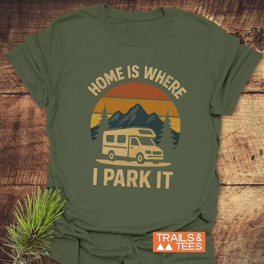 Home Is Where I Park It T-Shirt featuring a camper van, mountains, and pine branch, designed for comfort with durable prints and pre-shrunk fit.