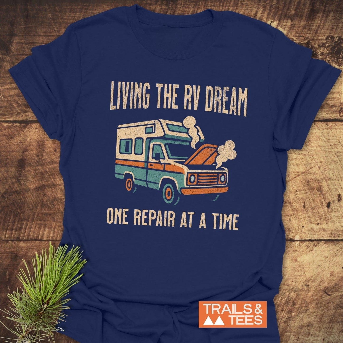Living The RV Dream T-Shirt featuring a camper design, perfect for adventure enthusiasts. Ideal for casual wear and showcasing a love for RV life.