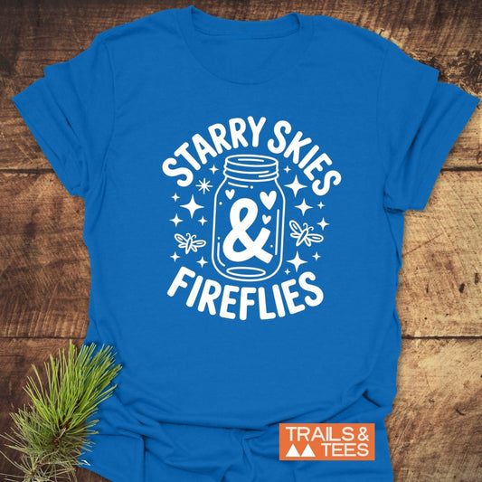 Starry Skies & Fireflies T-Shirt featuring white text, close-up of a logo, and blue and white sign, highlighting its active wear design.