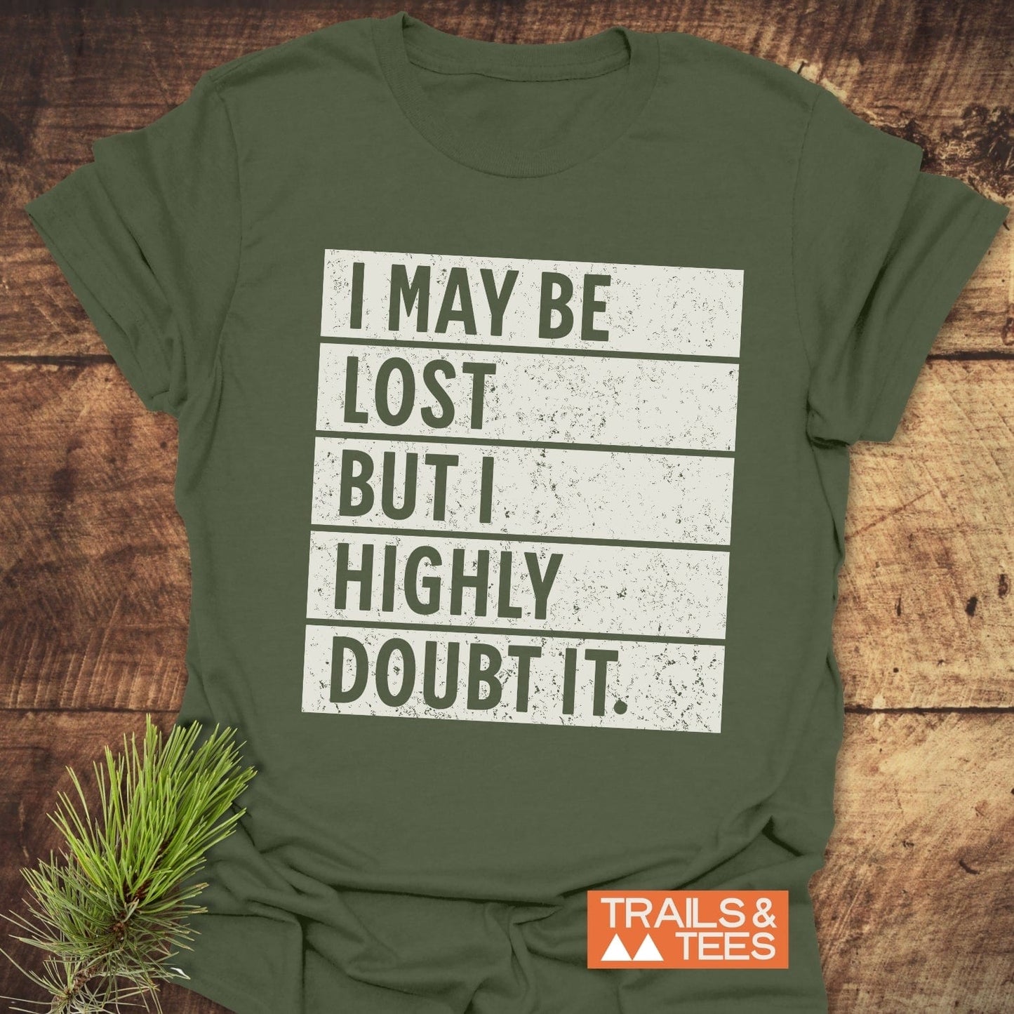 Close-up of the I May Be Lost But I Highly Doubt It T-shirt featuring bold white text, emphasizing its casual, active wear style.