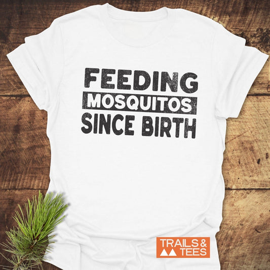 Feeding Mosquitos T-Shirt featuring black text on white fabric, crafted from lightweight cotton for comfort and durability, ideal for outdoor enthusiasts.