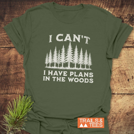 Green I Can't I Have Plans T-shirt, crafted from soft ring-spun cotton, featuring durable prints for outdoor enthusiasts, highlighting comfort and sustainability.
