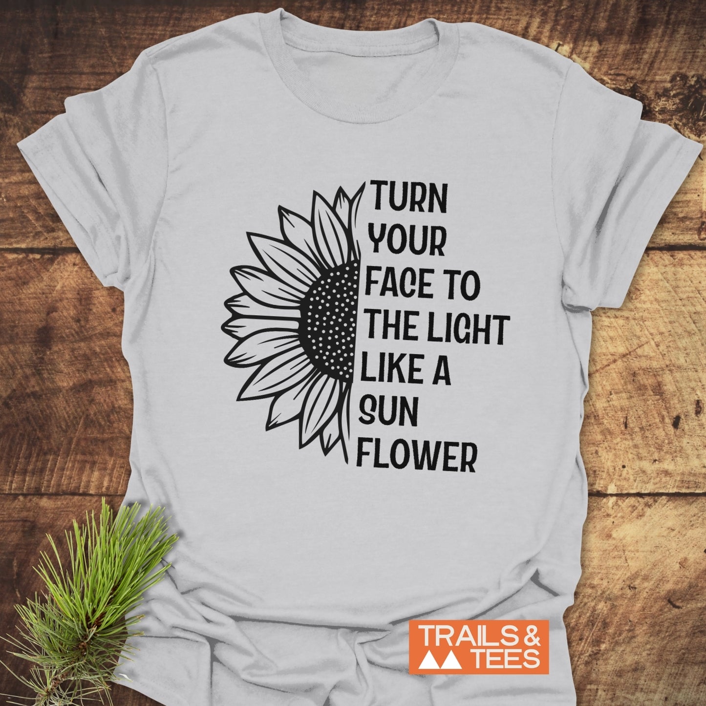 Turn Your Face To The Light T-Shirt featuring a sunflower design, crafted from soft cotton, ideal for outdoor adventures with durable, fade-resistant print.
