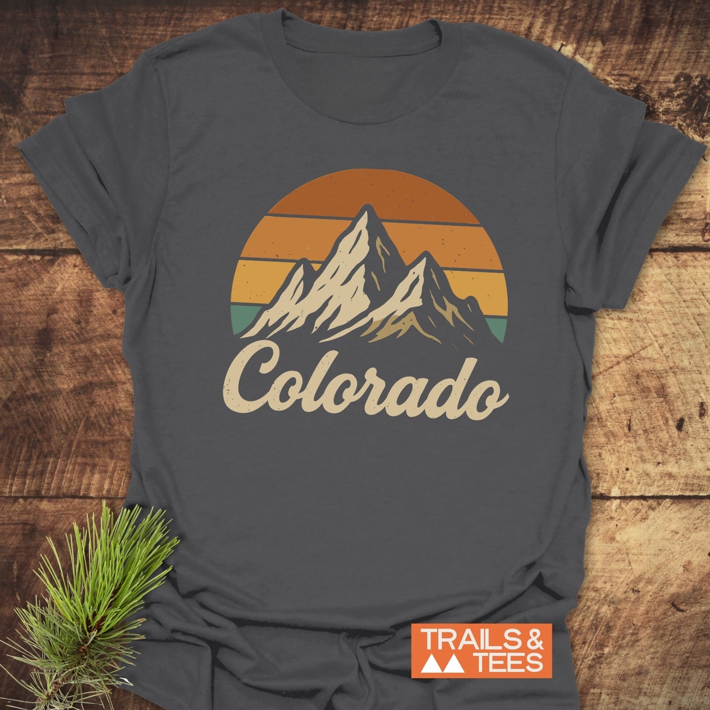 Colorado Sunset T-Shirt featuring a mountain and pine branch design, perfect for active wear.