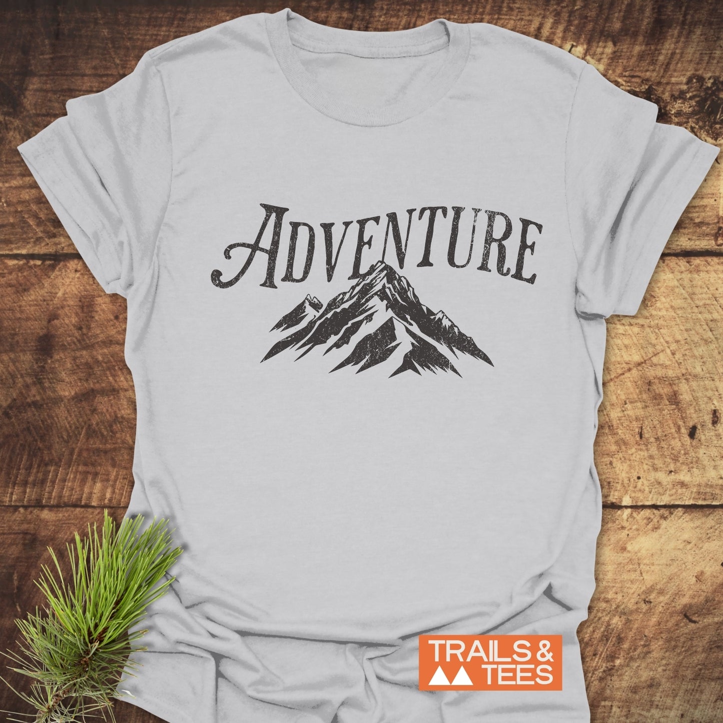 Adventure Vintage T-Shirt close-up showcasing durable black text print on soft, lightweight ring-spun cotton, designed for comfort and outdoor adventures.