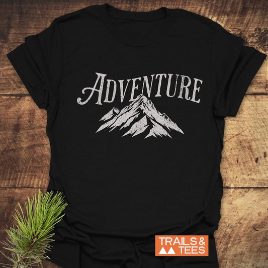 Adventure Vintage T-Shirt featuring a mountain logo, crafted from soft cotton for comfort and durability, ideal for outdoor enthusiasts.