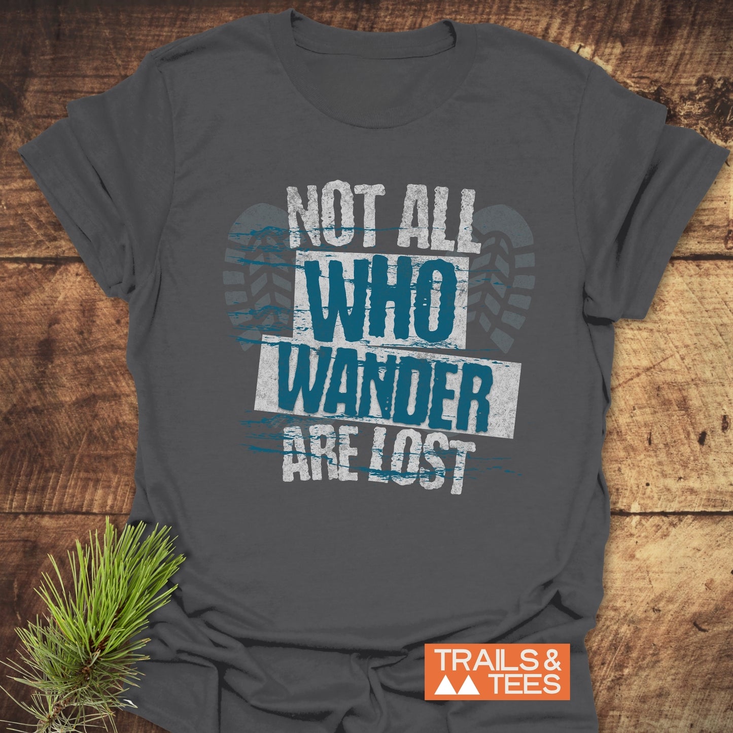 Grey Not All Who Wander Are Lost T-shirt with white text, showcasing a simple and active design, ideal for casual wear.