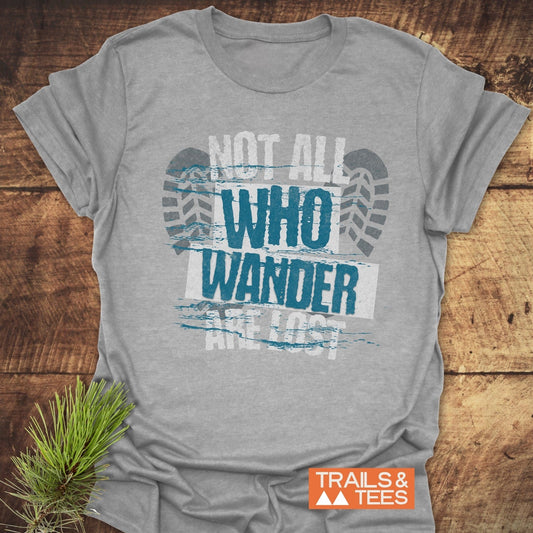 Close-up of 'Not All Who Wander Are Lost' t-shirt with blue text, showcasing its active wear design.