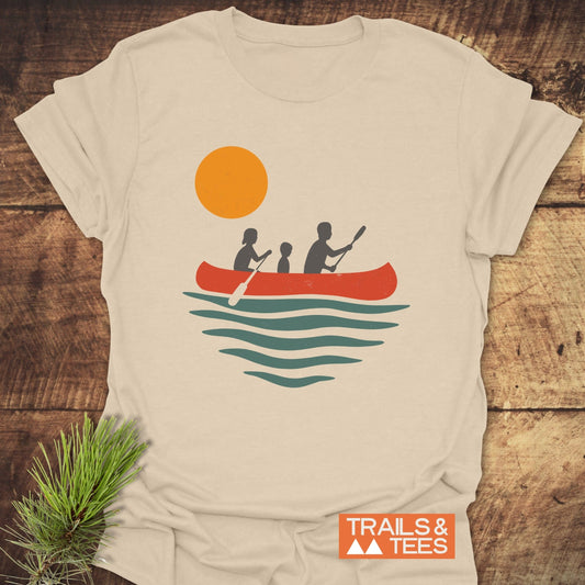 Family Canoe T-Shirt showcasing a silhouette of a boy with a paddle, highlighting durable DTF prints on soft, lightweight ring-spun cotton for outdoor enthusiasts.