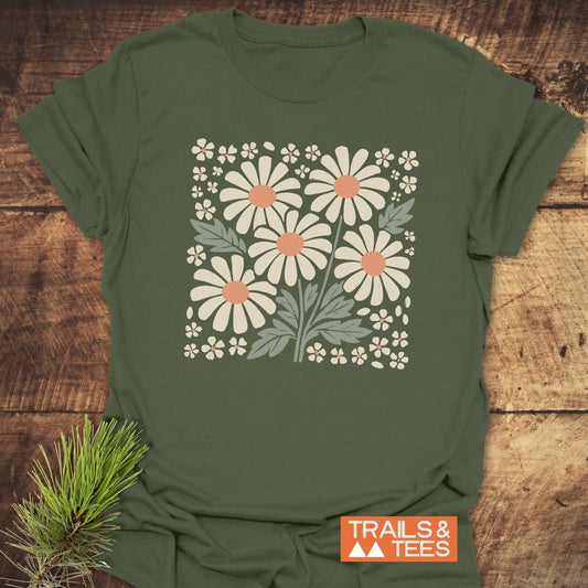 Retro Daisy Love T-Shirt featuring white floral design on a green background, crafted from lightweight cotton for comfort and durability, ideal for outdoor adventures.
