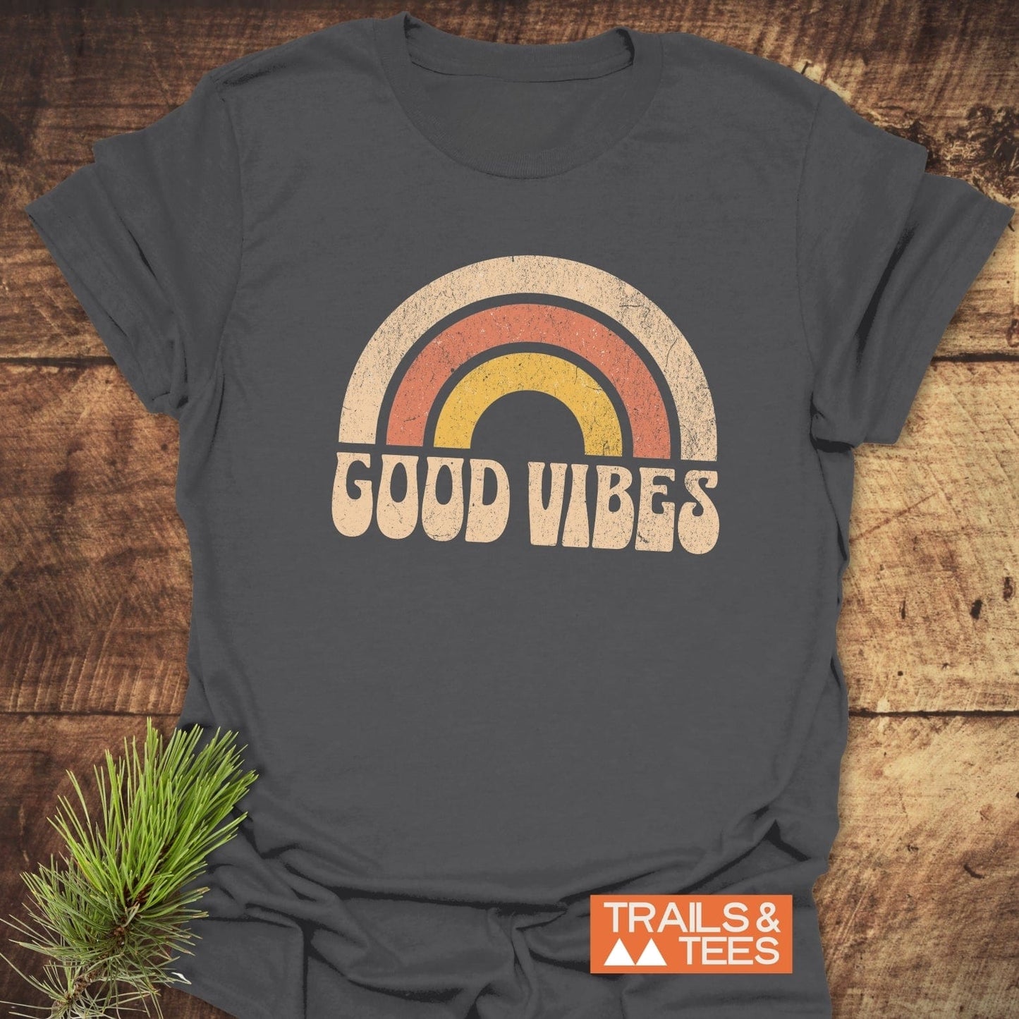 Good Vibes T-Shirt featuring a rainbow design, crafted from lightweight ring-spun cotton, with durable prints and taped shoulders for comfort and lasting shape.