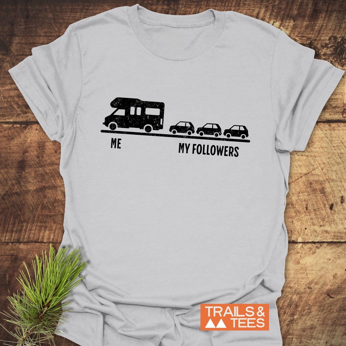 Me And My Followers T-Shirt featuring a black silhouette of a bus design, close-up on the shirt's front, highlighting its casual style.