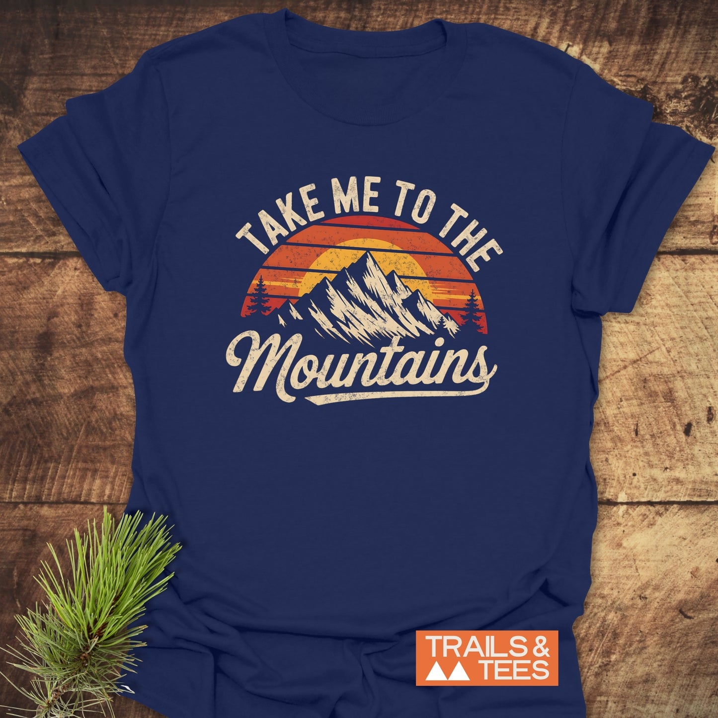 Take Me To The Mountains T-Shirt with bold white text, designed for active wear, featuring a nature-inspired theme.