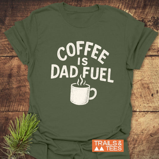 Coffee Is Dad Fuel T-Shirt featuring durable white text on a green cotton fabric, designed for comfort and outdoor adventures, pre-shrunk for reliable fit.