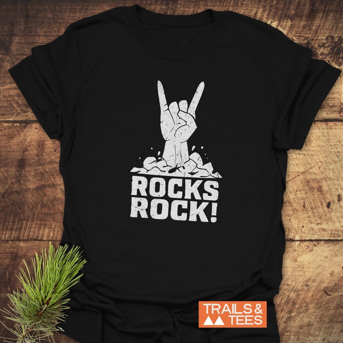 Rocks Rock! T-Shirt with a hand gesture print, crafted from soft ring-spun cotton, offering comfort and durability for outdoor enthusiasts.