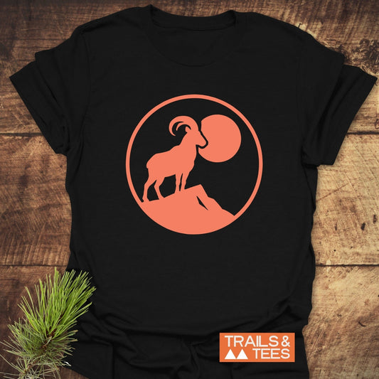 Mountain Goat T-Shirt featuring a goat and tree design, crafted from soft, ring-spun cotton for comfort and durability, perfect for outdoor enthusiasts.