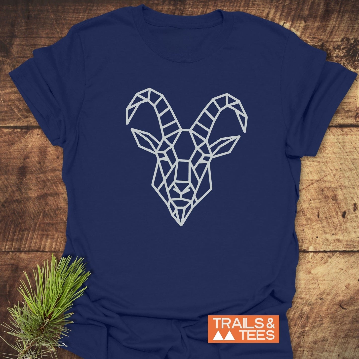 Geometric Mountain Goat T-Shirt featuring white diamond pattern; crafted from soft cotton for comfort, with durable prints and no side seams for lasting shape.