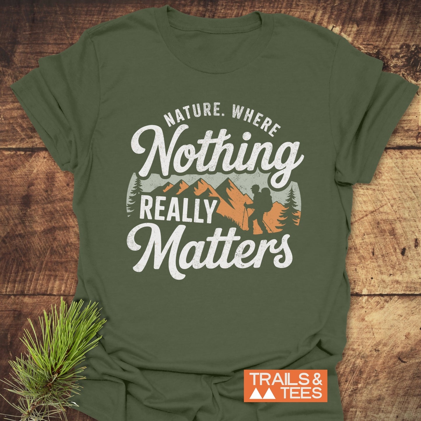Close-up of the Nature. Where Nothing Really Matters T-Shirt, featuring white text on a soft, lightweight, pre-shrunk cotton fabric designed for outdoor enthusiasts.