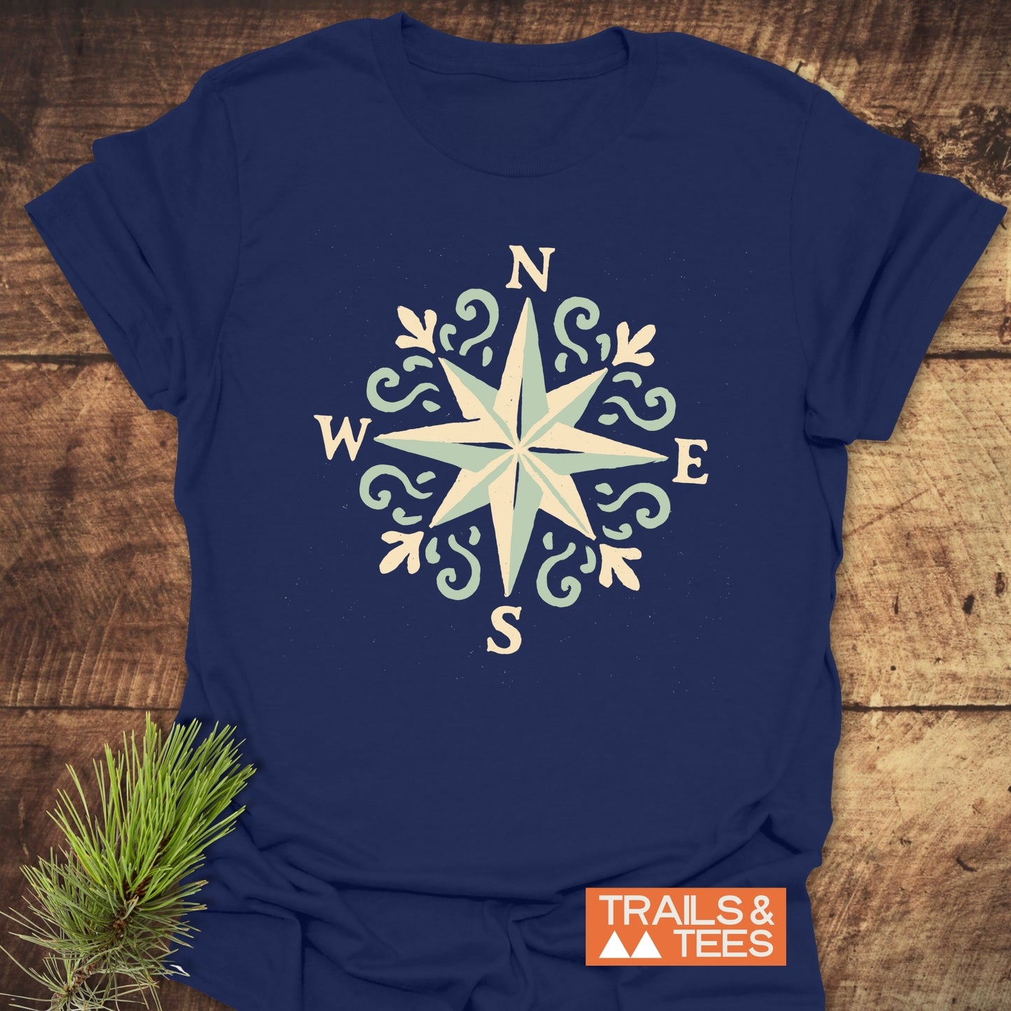 Compass Rose T-Shirt featuring a compass design, crafted from soft ring-spun cotton for comfort during outdoor adventures, with durable prints for lasting wear.