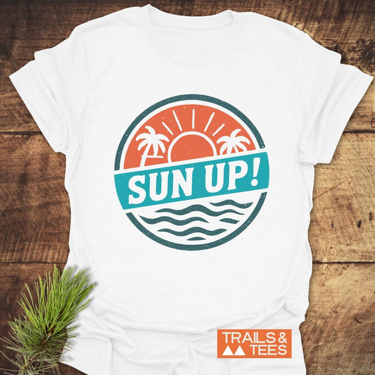 Sun Up! Vintage T-Shirt featuring a logo with a sun and palm trees, crafted from soft, lightweight cotton for comfortable, everyday outdoor adventures.