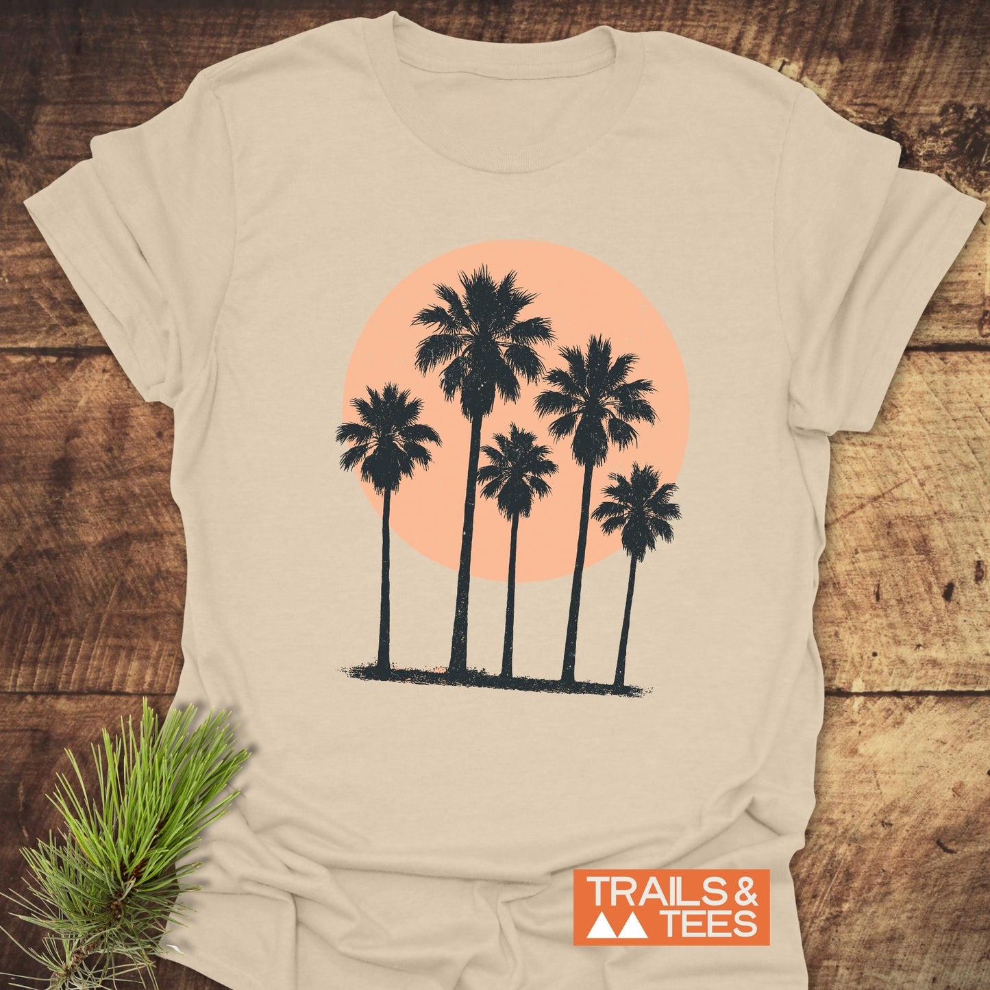 Palm Trees At Sunset T-Shirt features palm tree prints on a soft, lightweight cotton fabric, offering comfort and durability for everyday outdoor adventures.