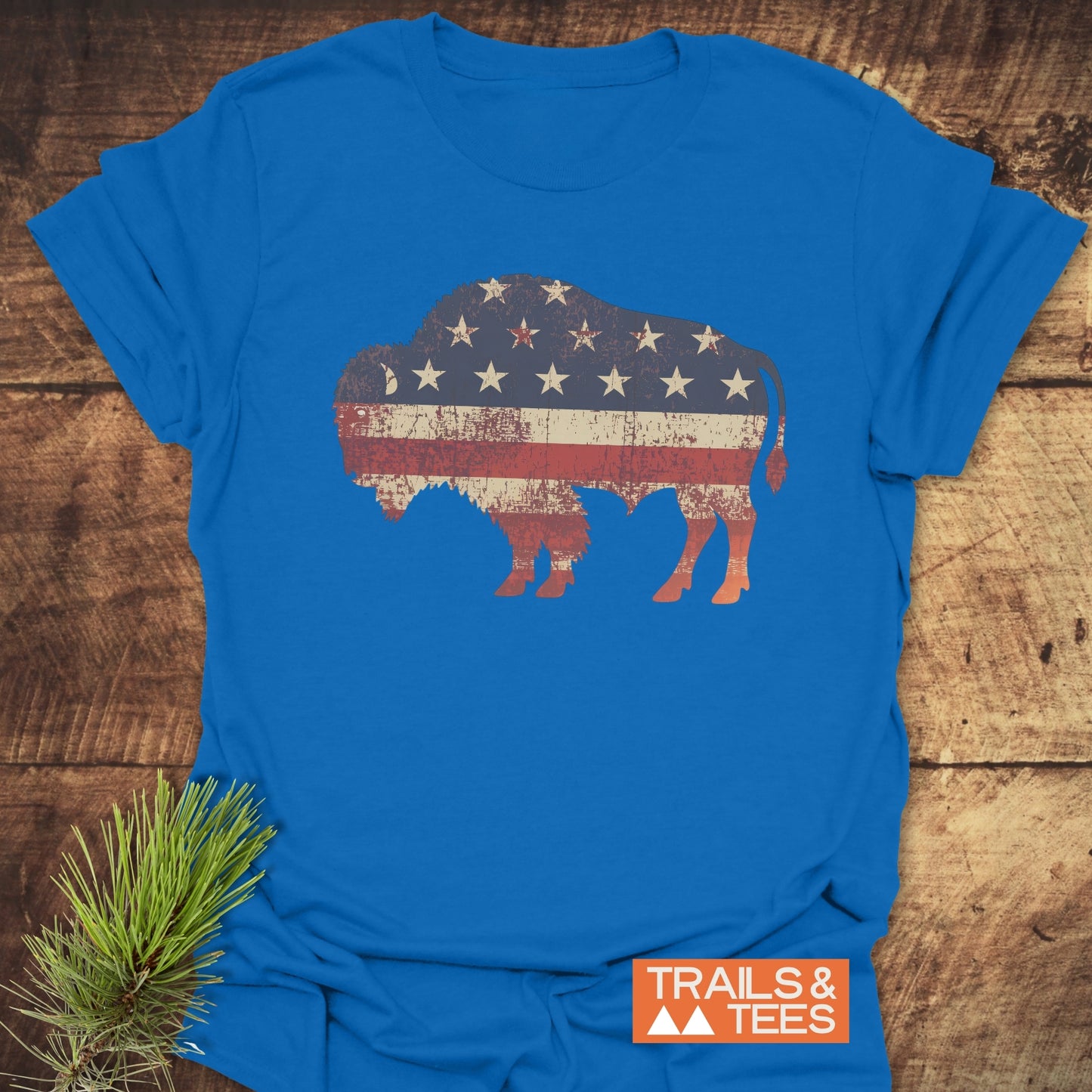 Land Of The Free Bison T-Shirt; close-up of the active shirt featuring a flag design, crafted from soft cotton, ideal for outdoor adventures.
