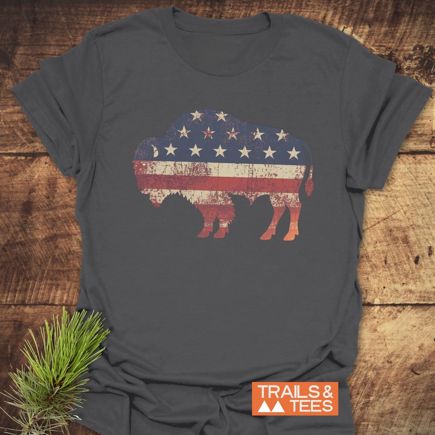 Land Of The Free Bison T-Shirt featuring a flag design, crafted from soft, lightweight cotton with durable prints, ideal for outdoor adventures and everyday comfort.