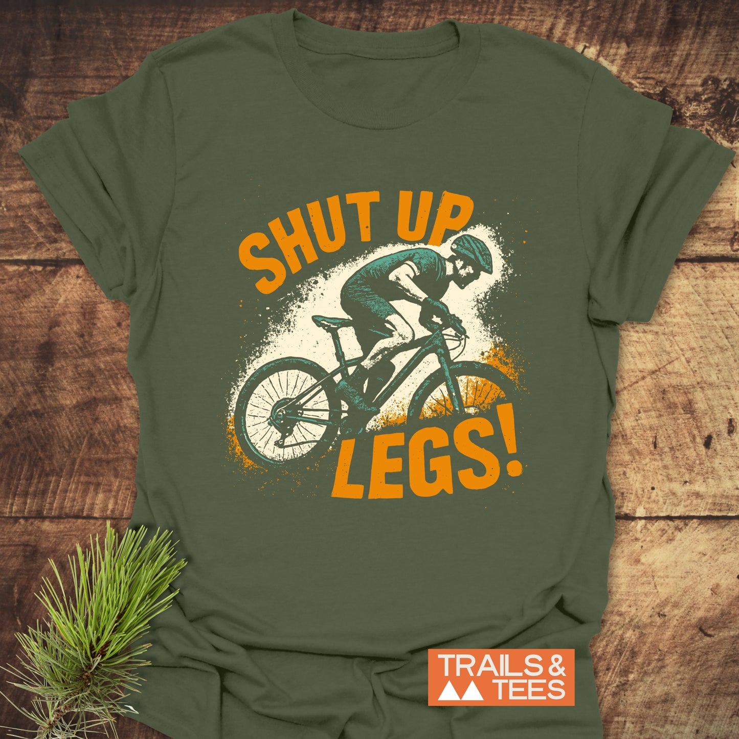 Close-up of the Shut Up Legs! Mountainbike T-Shirt showcasing its durable DTF prints, soft ring-spun cotton fabric, and seamless design for outdoor enthusiasts.