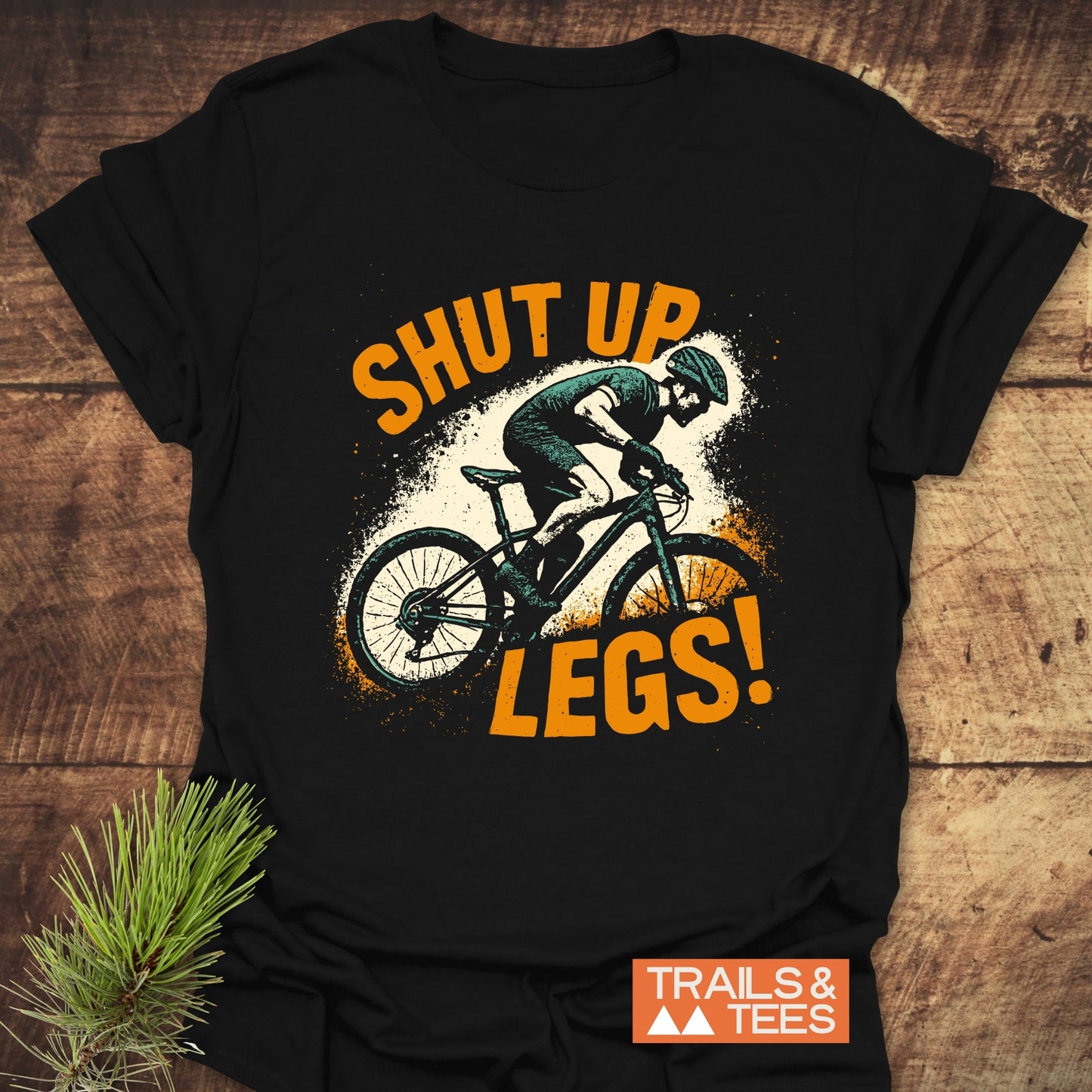 Shut Up Legs! Mountainbike T-Shirt featuring a cyclist print on soft, durable cotton, ideal for outdoor adventures and everyday comfort.