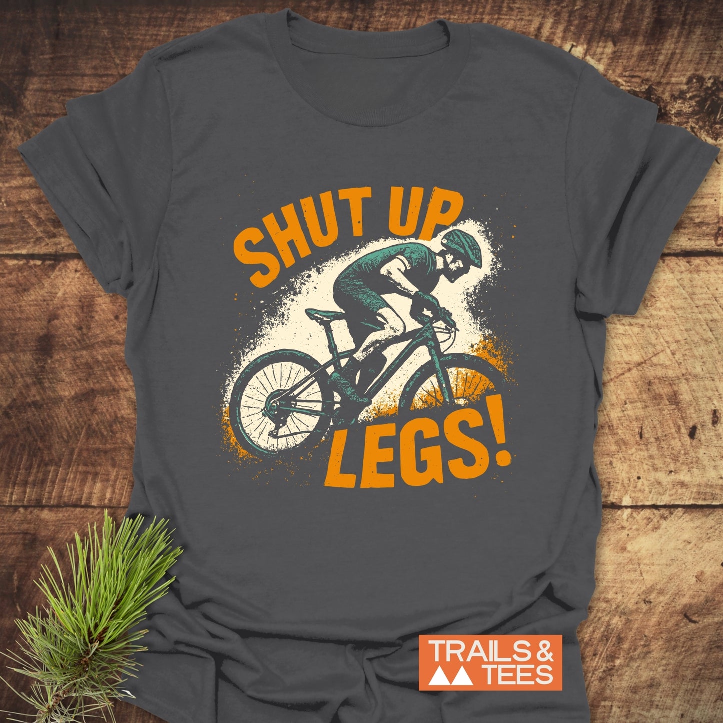 Close-up of the Shut Up Legs! Mountainbike T-Shirt featuring a man riding a bike, highlighting durable DTF prints and soft, lightweight cotton material.
