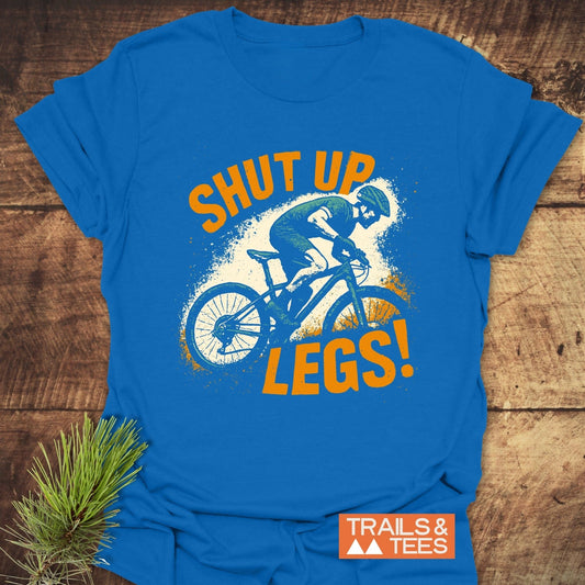 Shut Up Legs! Mountainbike T-Shirt showcasing a cyclist graphic, designed for comfort and adventure with durable, pre-shrunk cotton and seamless construction.