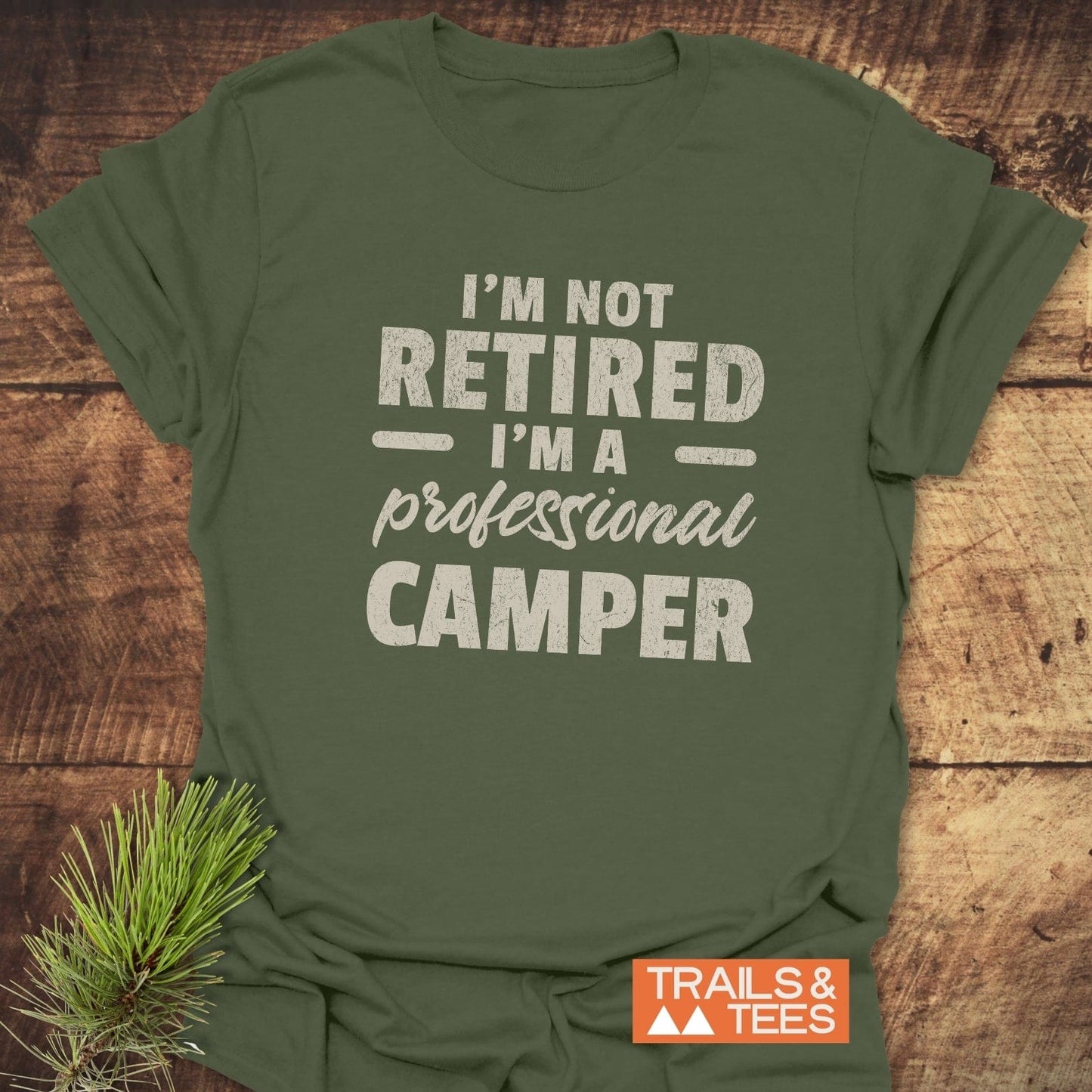 Not Retired T-Shirt with white text, crafted from soft ring-spun cotton, designed for comfort and durability. Perfect for everyday adventures and outdoor enthusiasts.