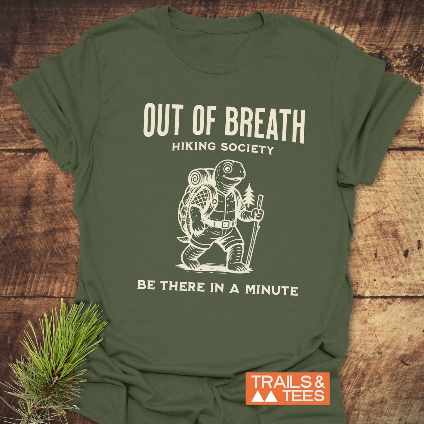 Out Of Breath Turtle T-Shirt featuring white text on a green shirt, crafted from soft, lightweight cotton for everyday outdoor adventures.